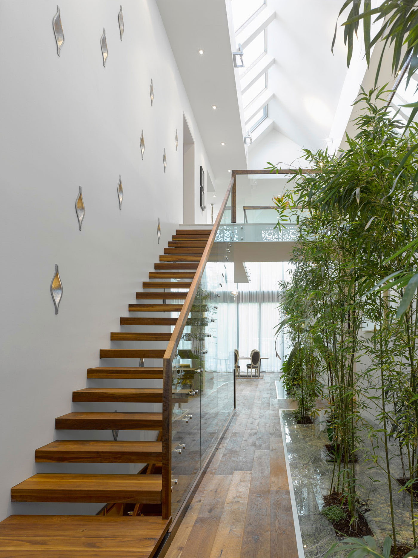 Modern Custom Home With Central Atrium And Interior Bamboo Garden