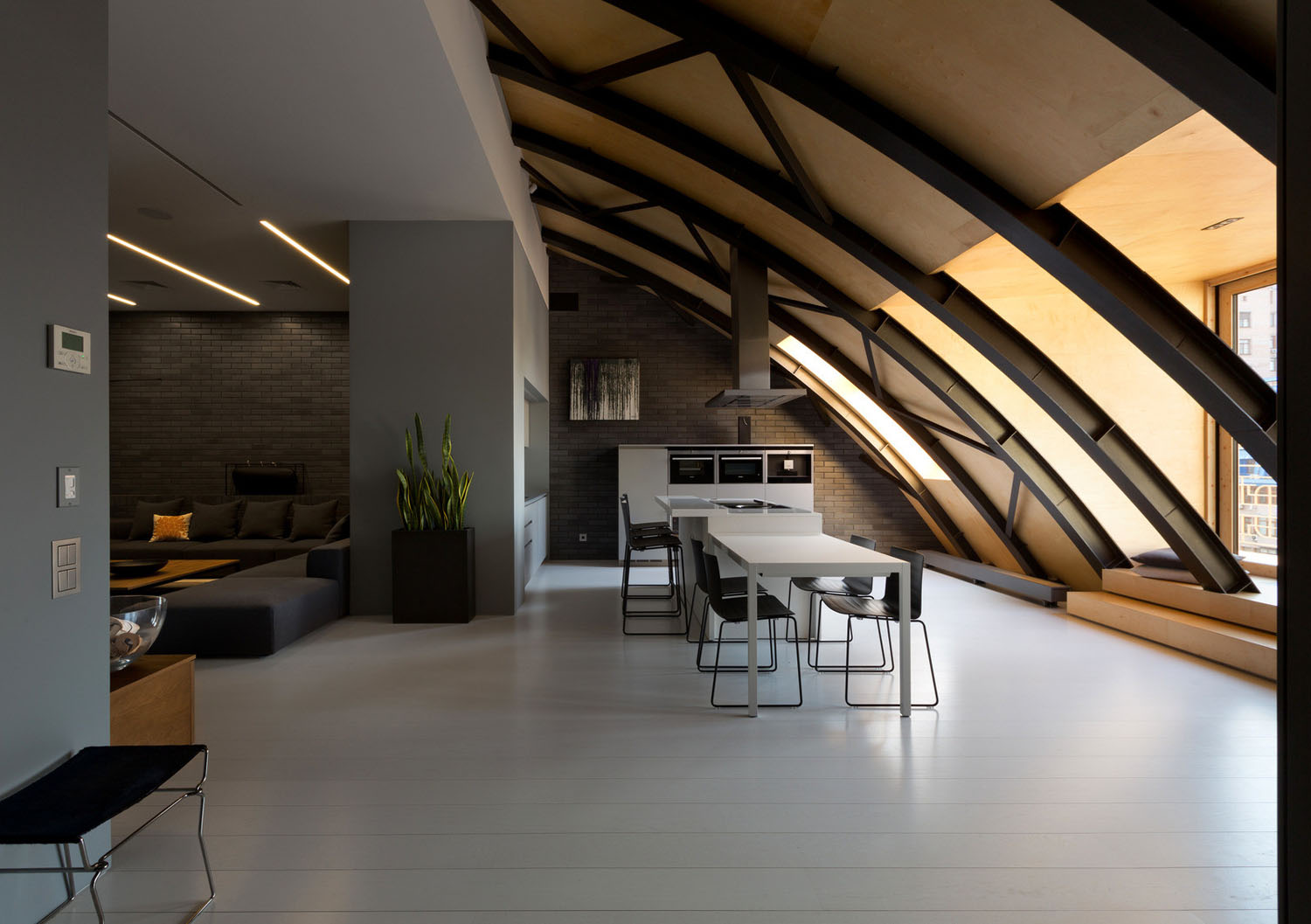 Industrial space with arc roof transformed into sophisticated ...