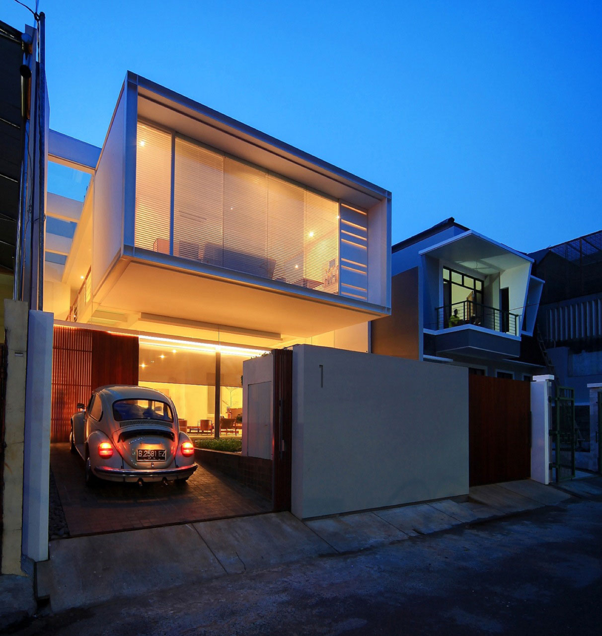 garage narrow houses urban indonesia cool modern jakarta architecture open floors parking contemporary garages night lighting archdaily stunning chrystalline space