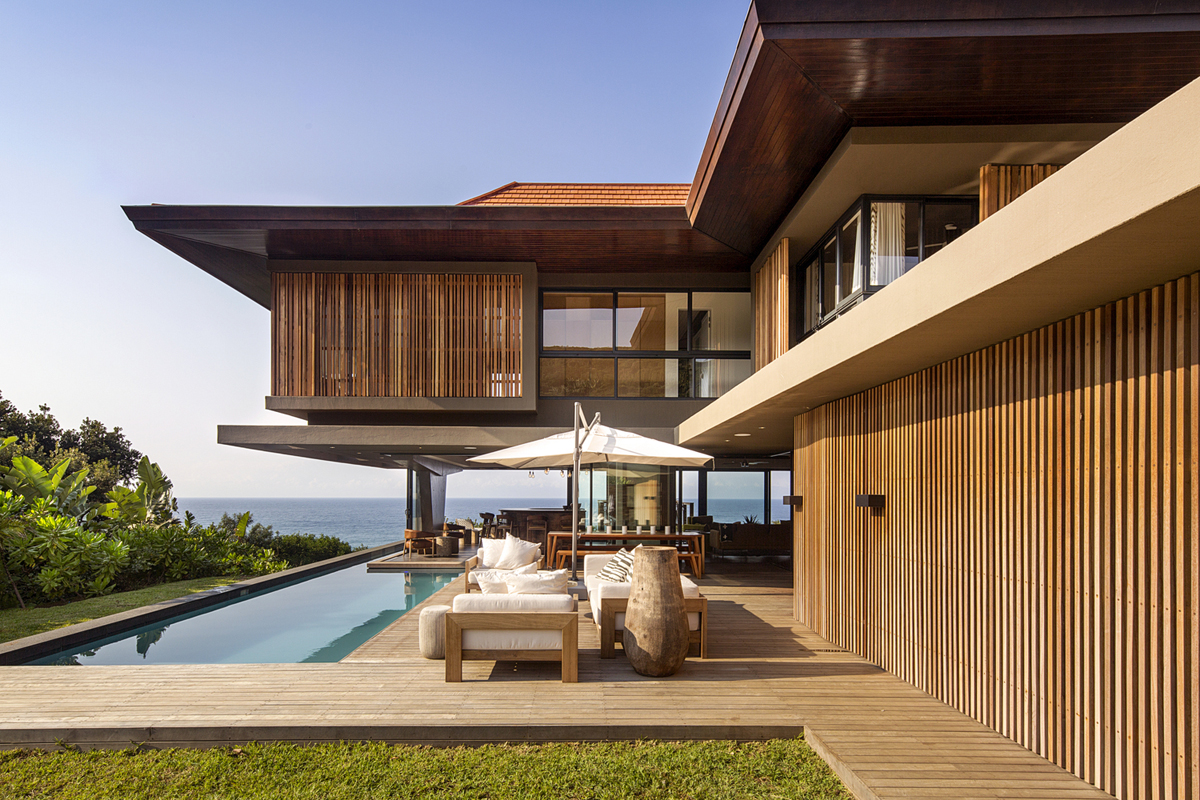 Coastal Home With Tropical Modern Architecture And Eclectic Interior 