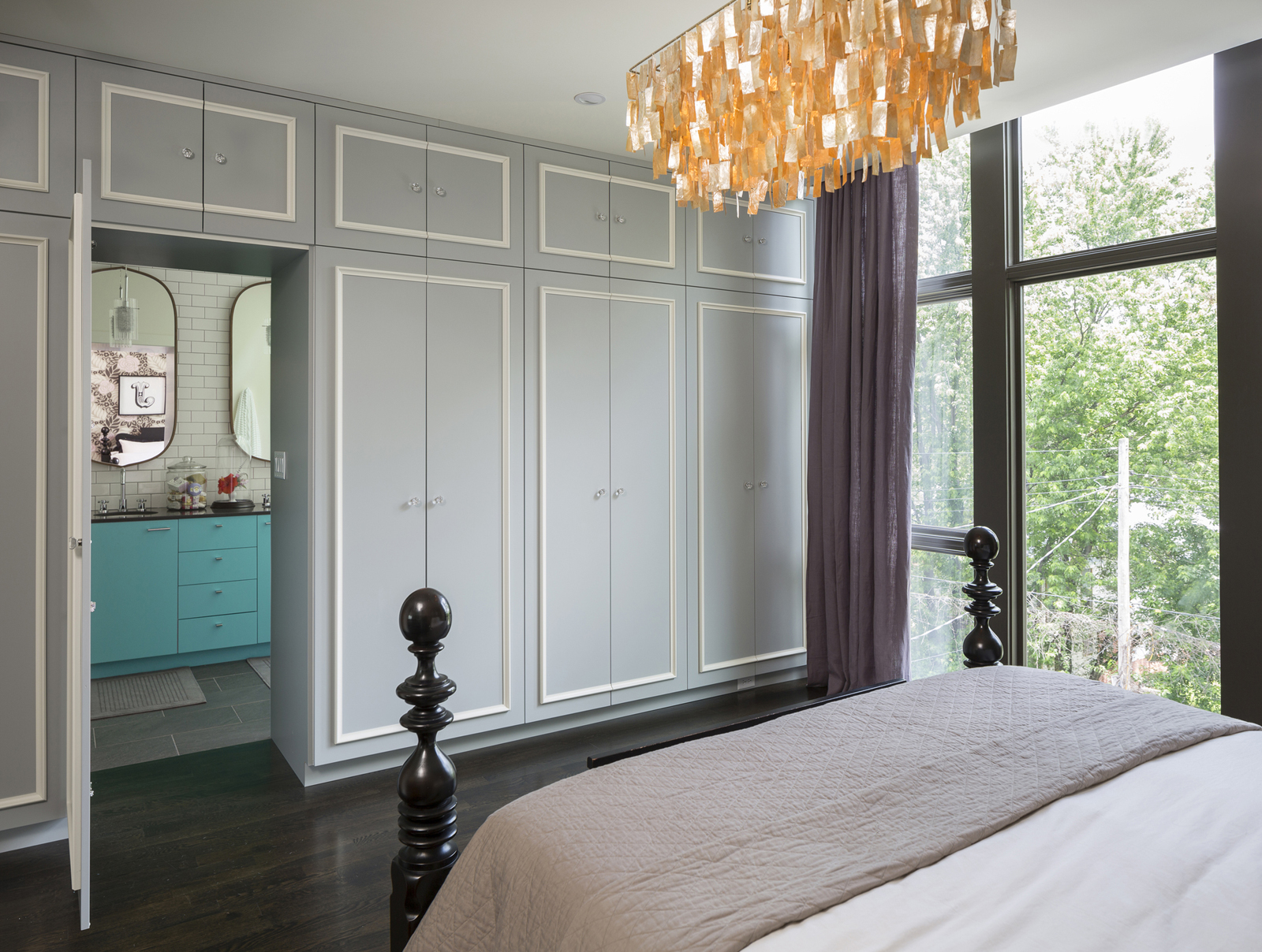 Bedroom built-in closet secret door to the bathroom