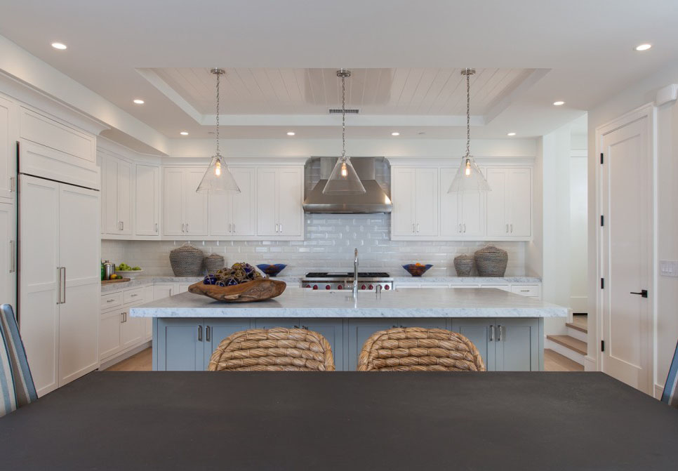 Modern White Kitchen with Marble Countertops