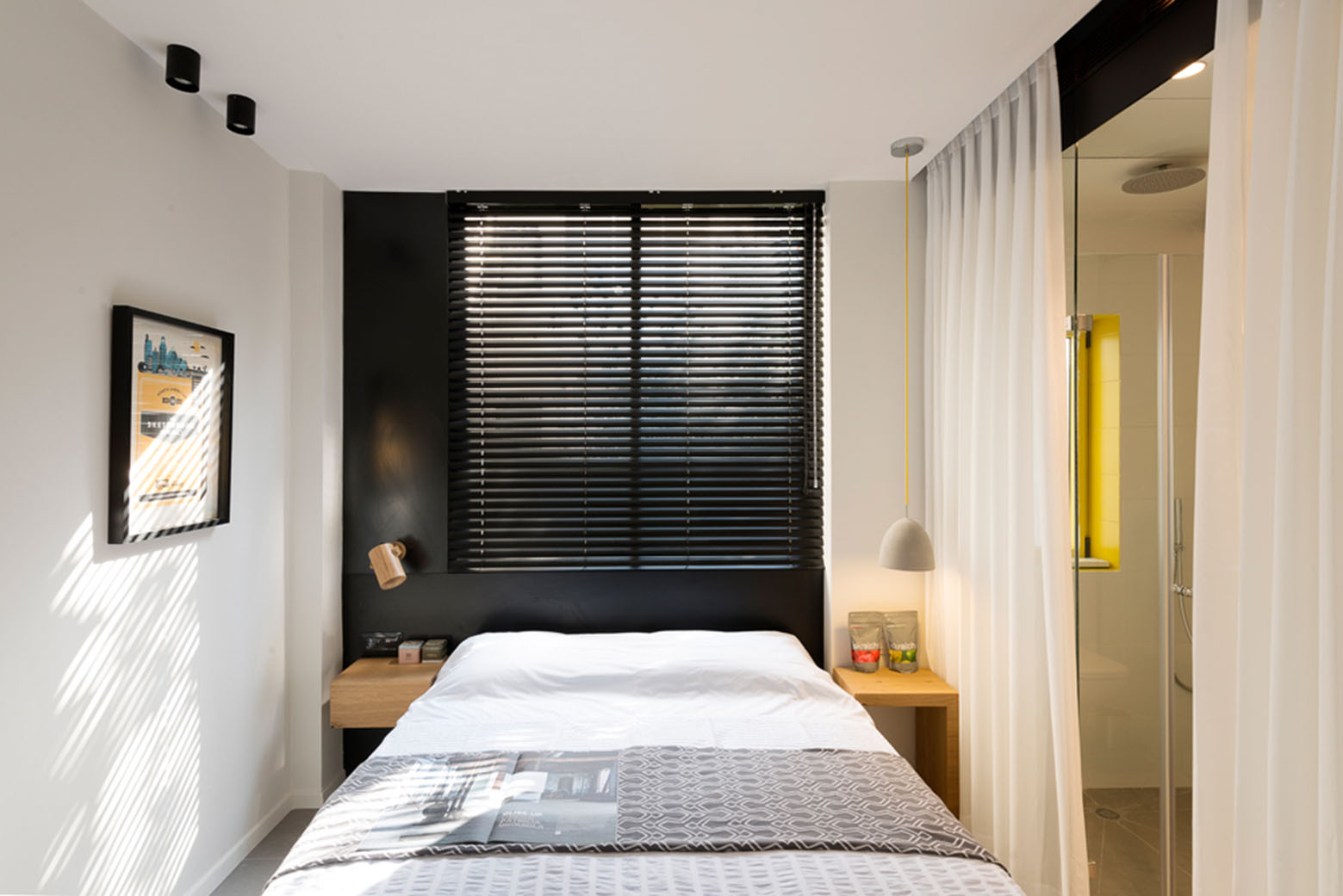 600 Square Foot Apartment Uses Glass Walls To Create Two Bedrooms