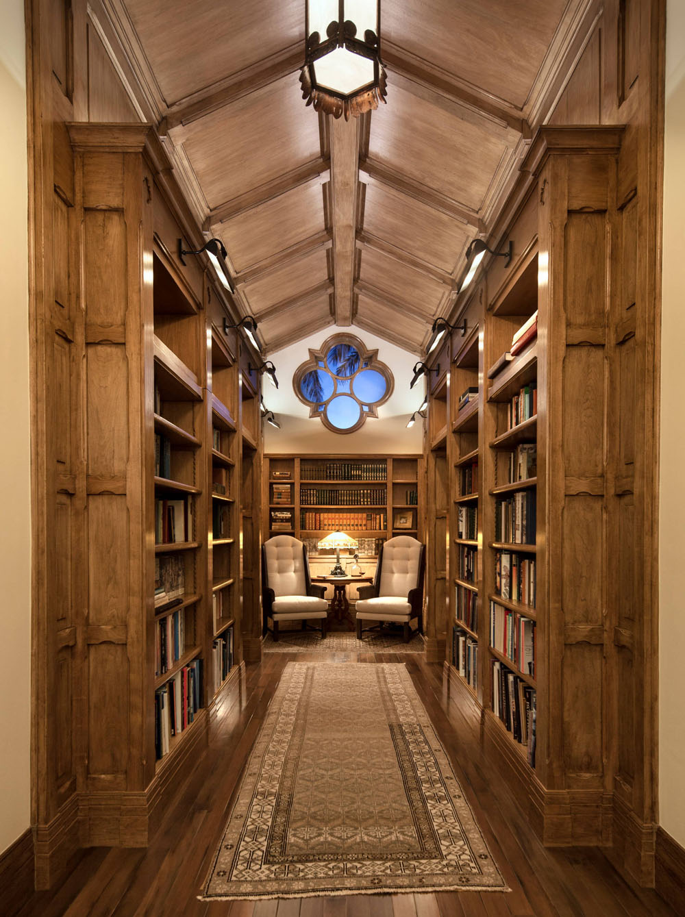 Wood-Paneled Library with Quatrefoil Window
