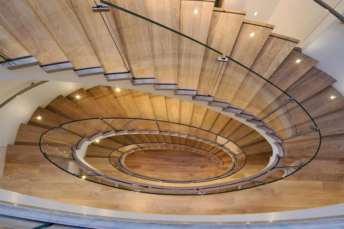 Elliptical Staircase with Glass Banister