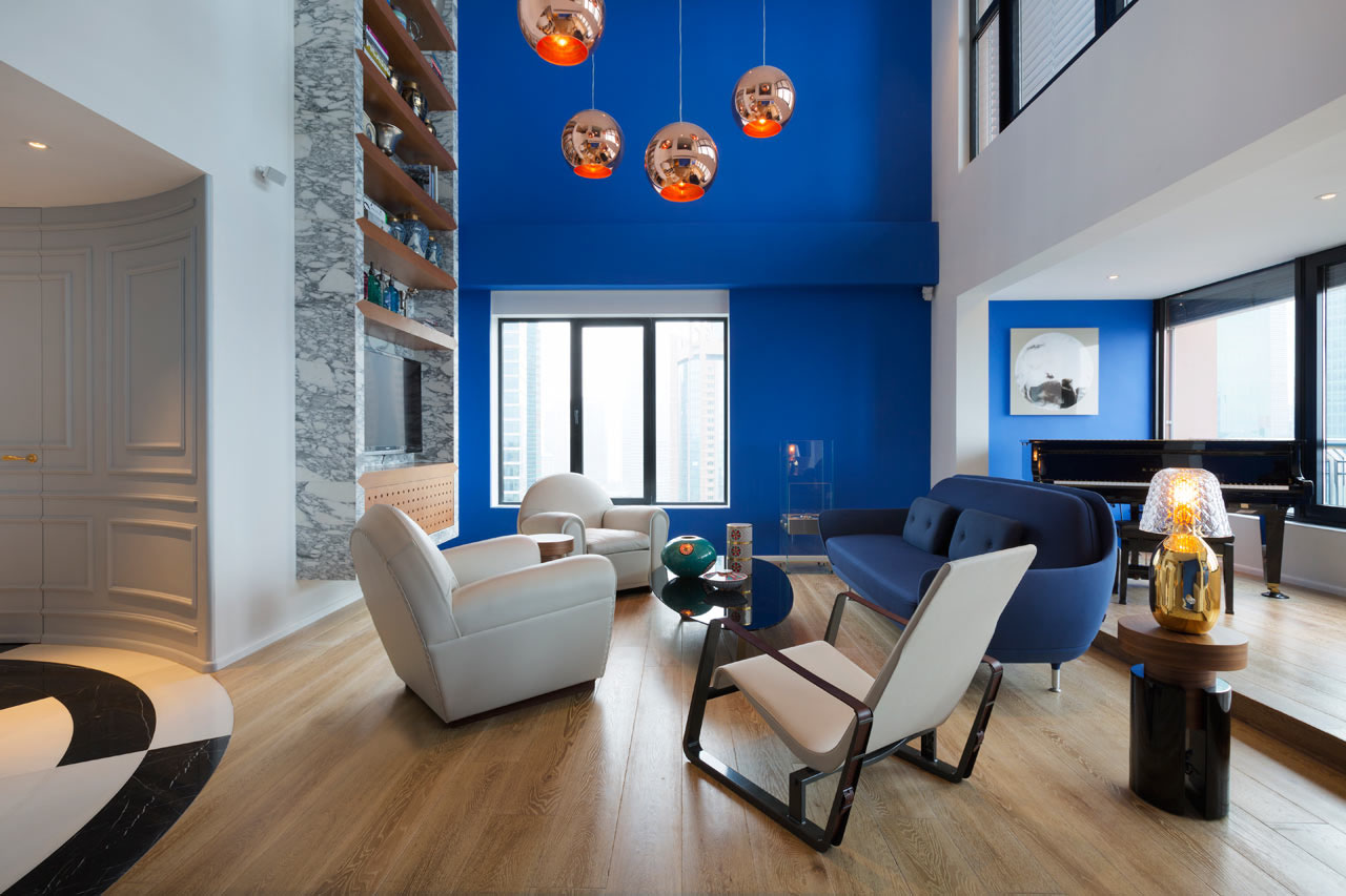 Unique Modern Penthouse with Blue Wall