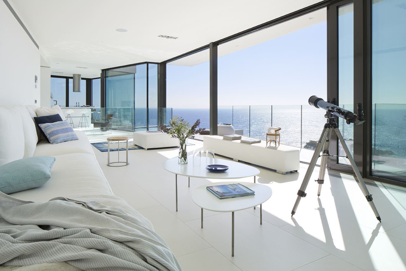 Modern Living Room with Large Glass Windows and Ocean View