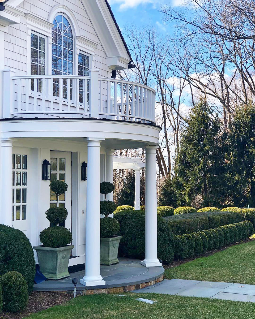 Classic Portico with Balcony and Topiaries