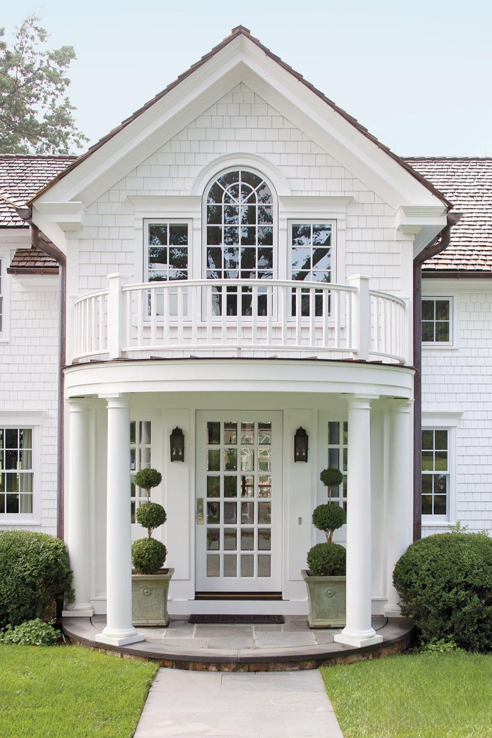 Classic Portico with Balcony and Topiaries