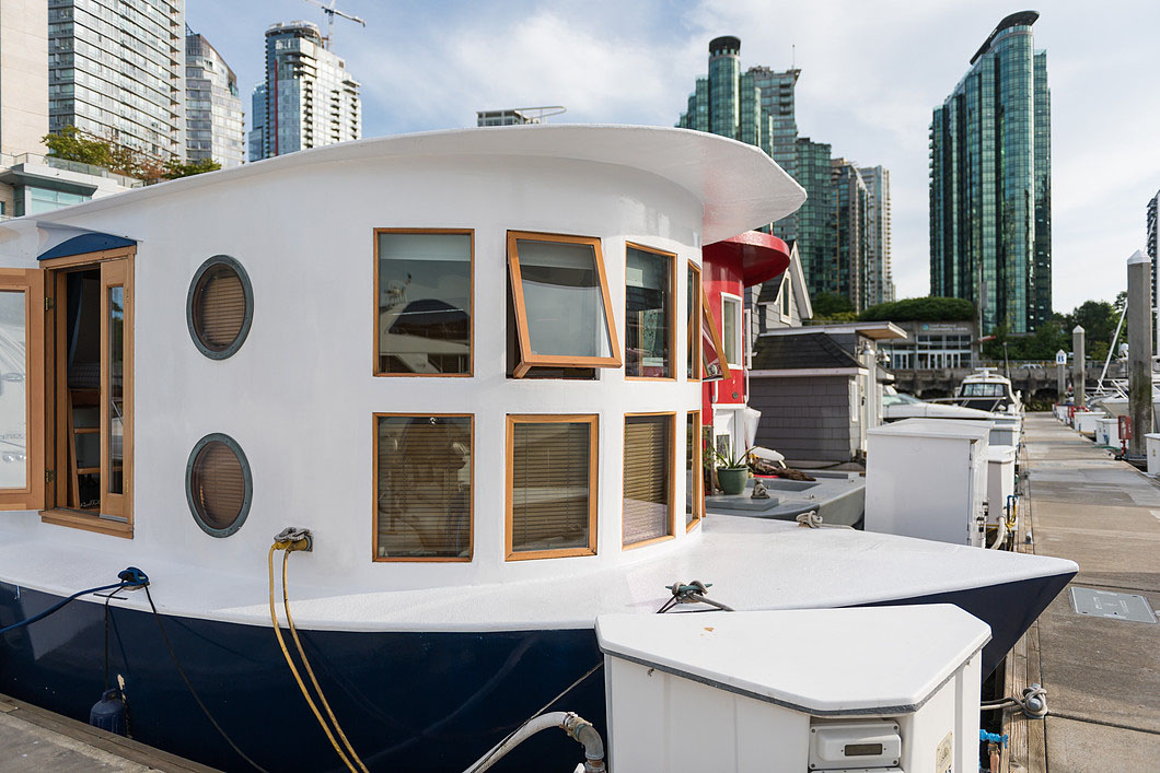 Cute Houseboat Provides Affordable Living With A Unique 