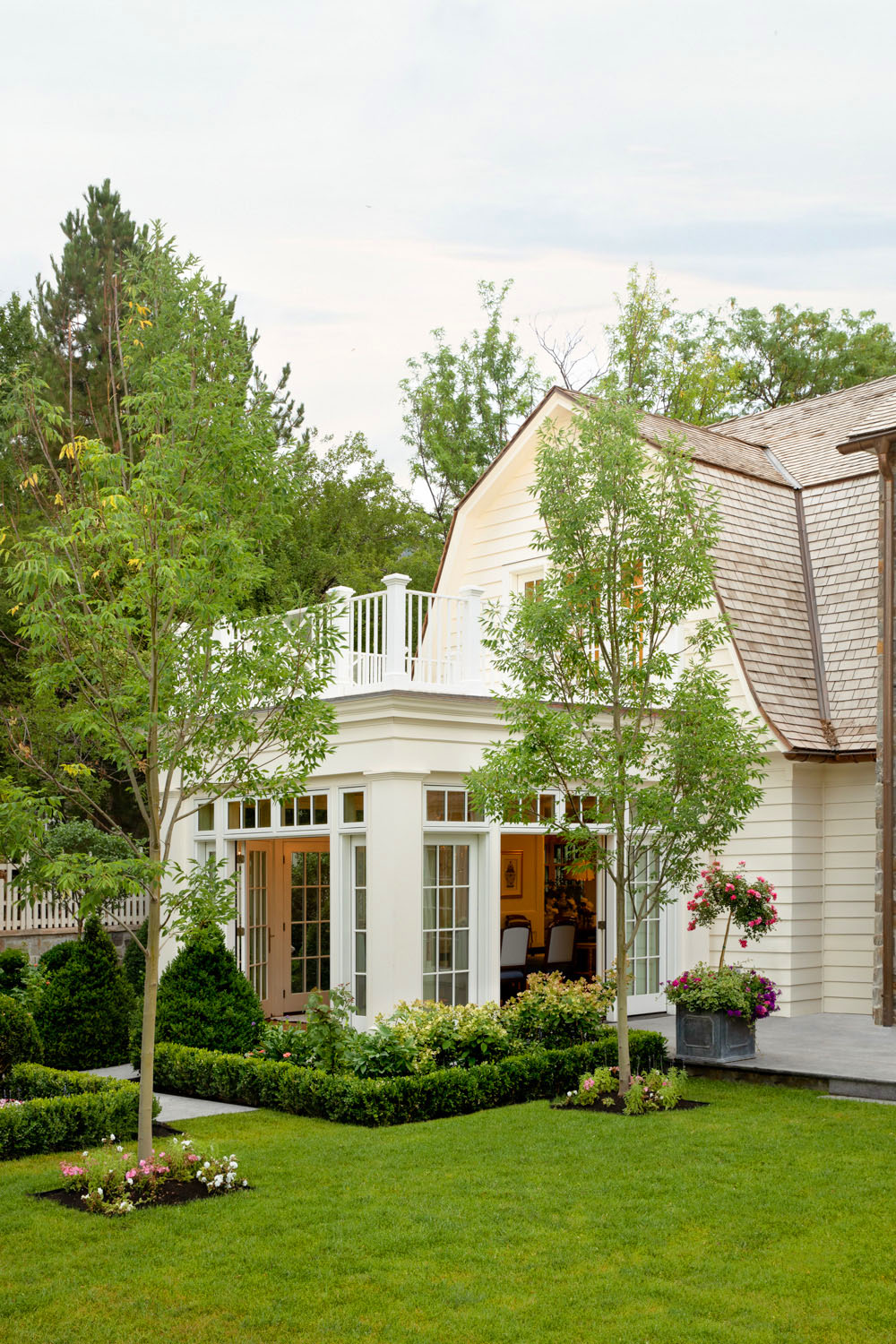 Classic Traditional Home Conservatory Opens to Secret Garden