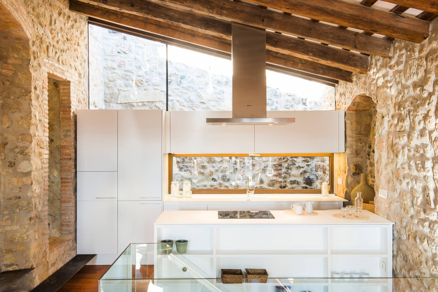 Modern Kitchen with Stone Walls