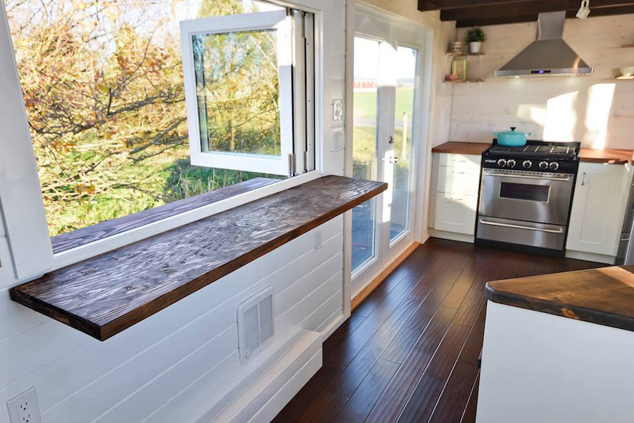 Custom Mobile Tiny House With Large Kitchen And Two Lofts