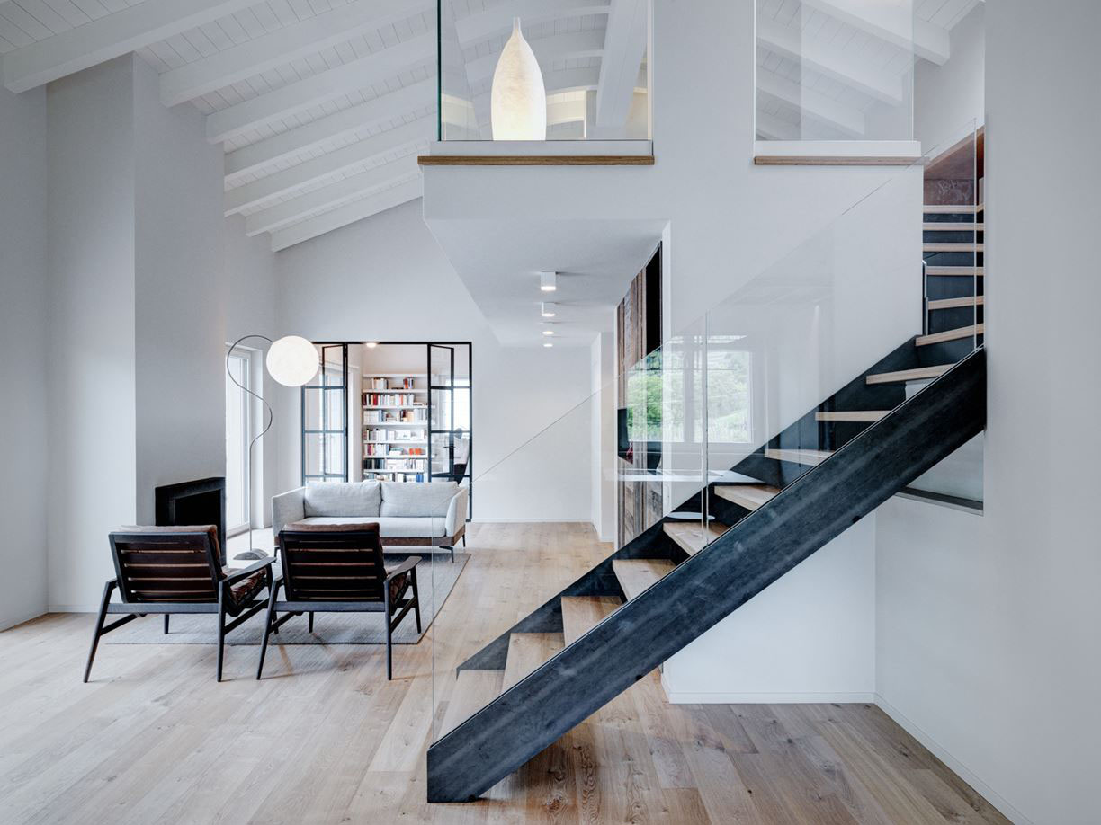 Double Height Loft With Wood Iron And Glass Staircase To