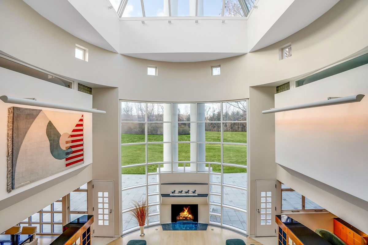 Dramatic Double-Height Modern Rotunda Set Under a Glass Skylight