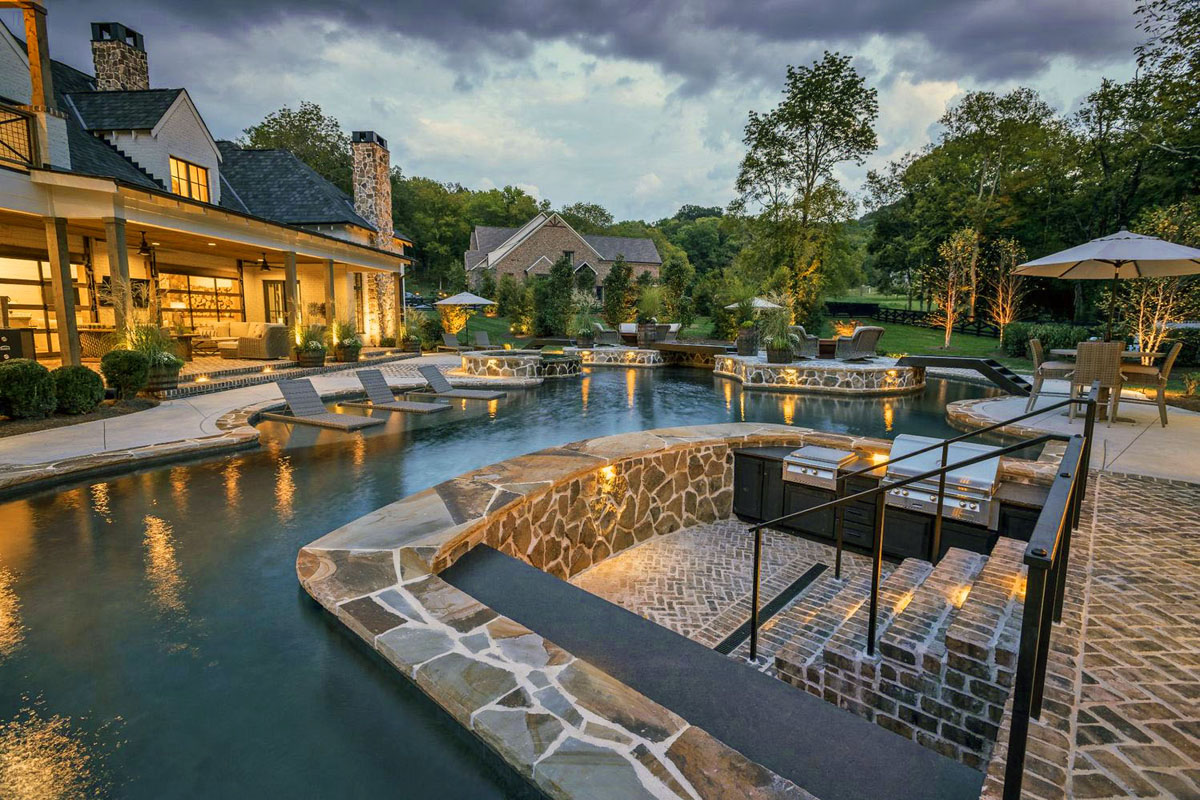 Pool With Lazy River Swim Up Bar And Outdoor Grilling Station