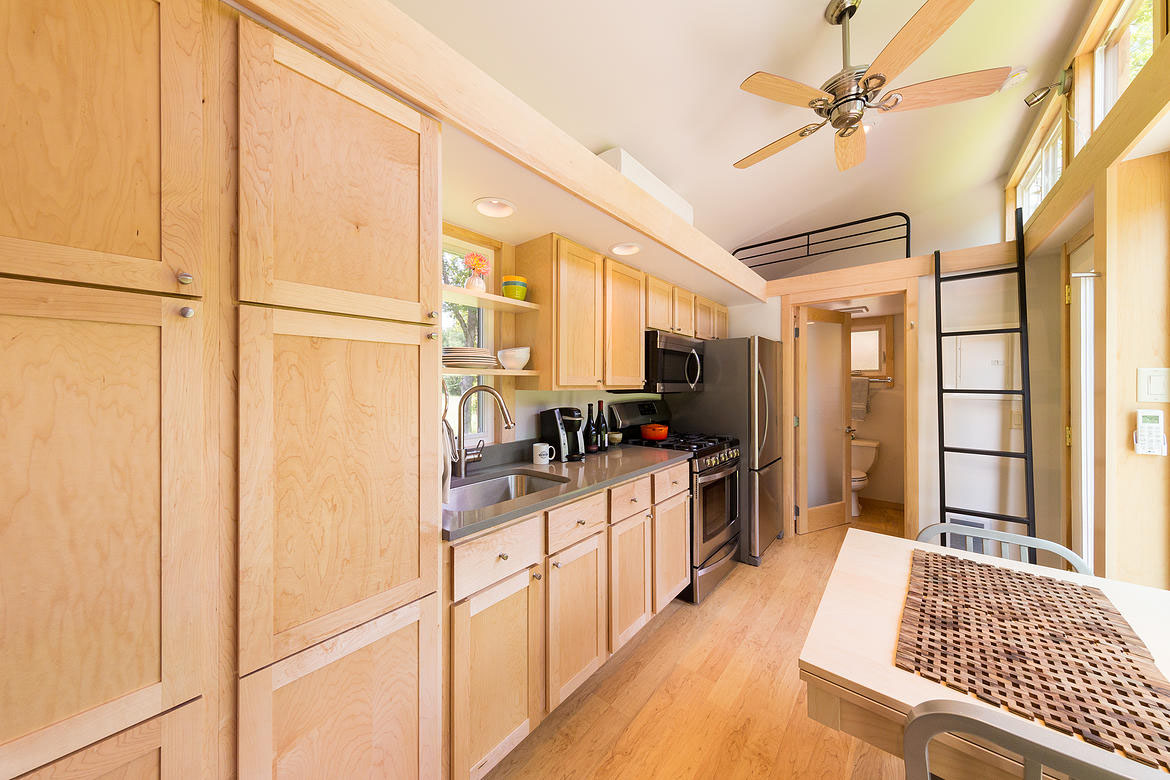 Tiny House Kitchen with Oak Cabinet and Quartz Countertop