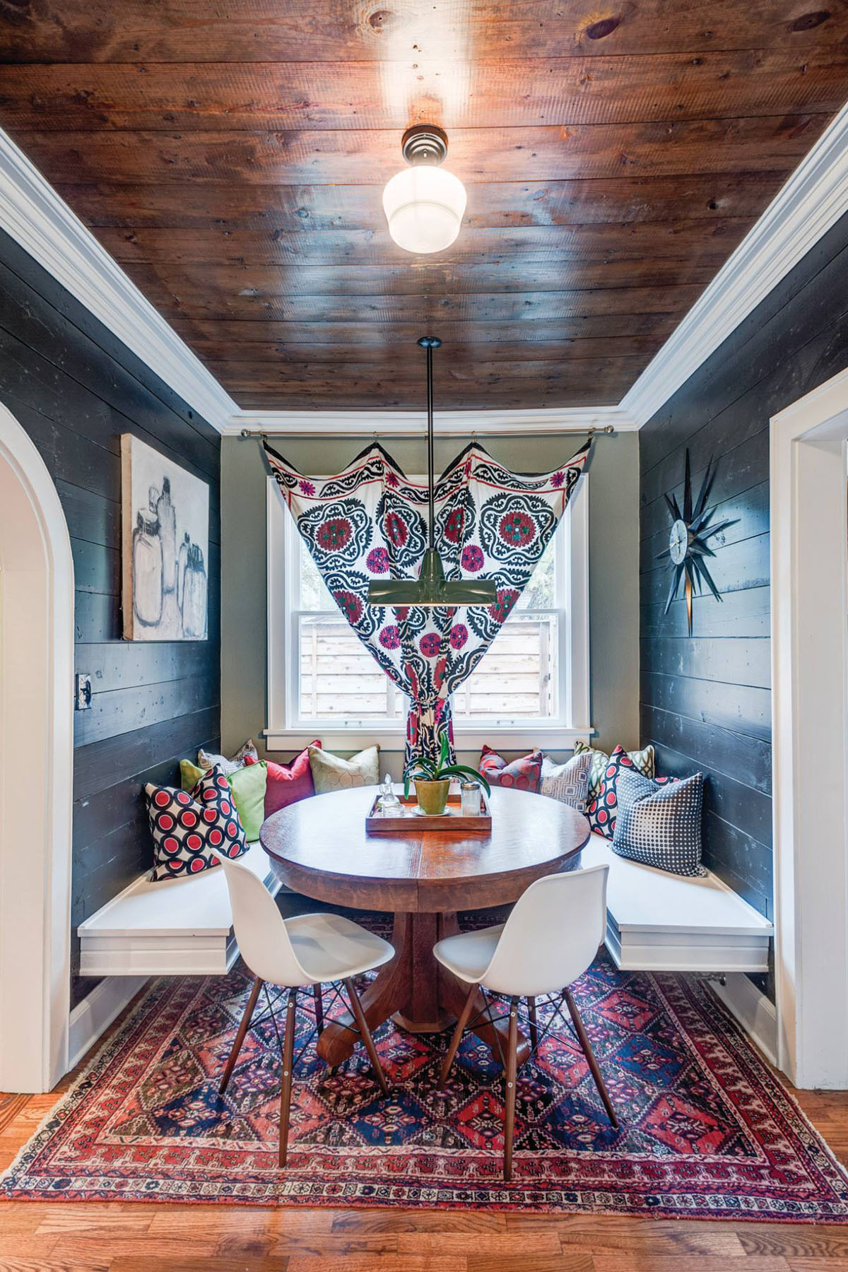 Breakfast Room with Wood Plank Wall and Seating Bench