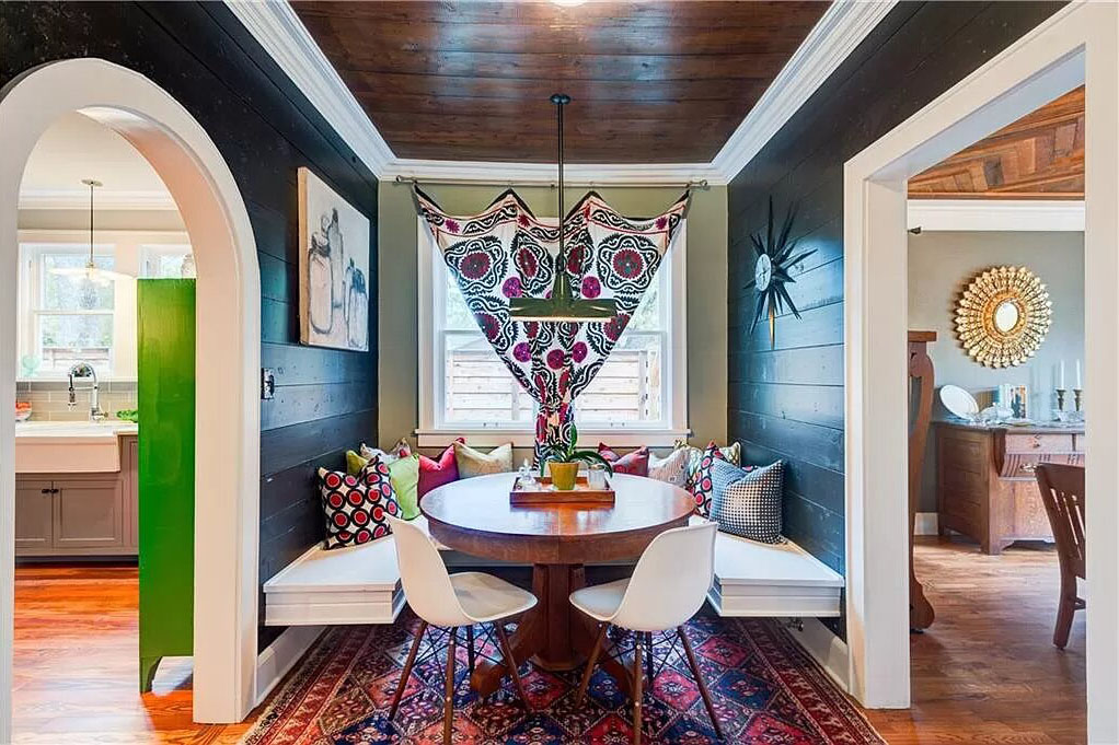 Breakfast Room with Wood Plank Wall and Seating Bench