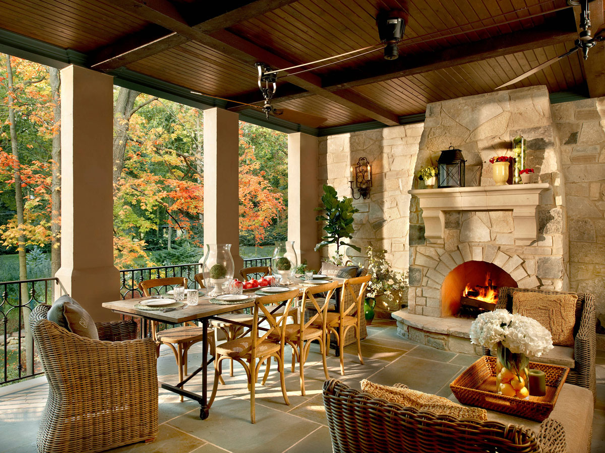 Covered Porch for Al Fresco Dining with Limestone Fireplace