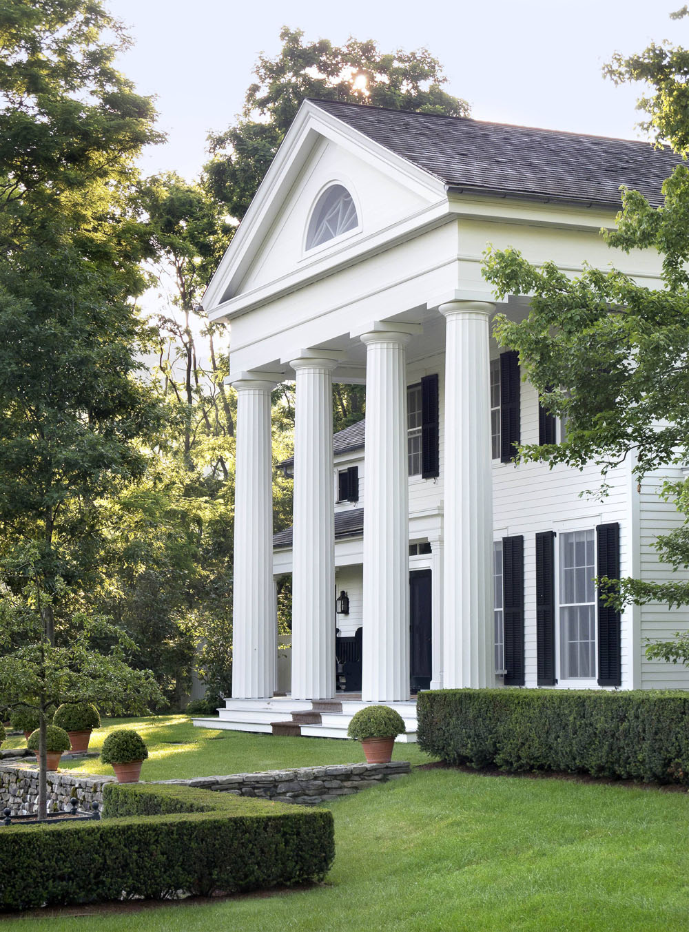 Classic Greek Revival House On A Wooded Hillside classic-greek-revival-house-on-a-wooded-hillside