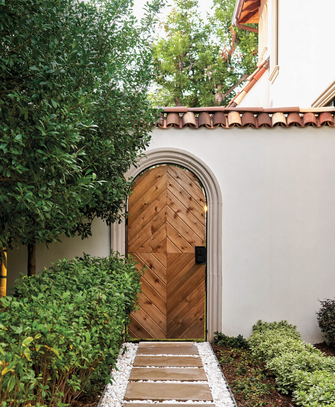 Wooden Arch Door and Red Clay Roof Tiles