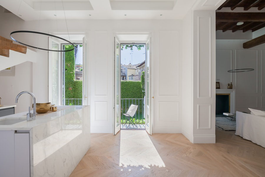 Kitchen opens to balcony