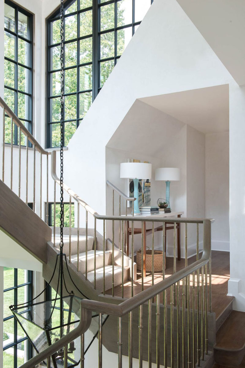 Dramatic Two-Story Atrium with Squared Spiral Staircase