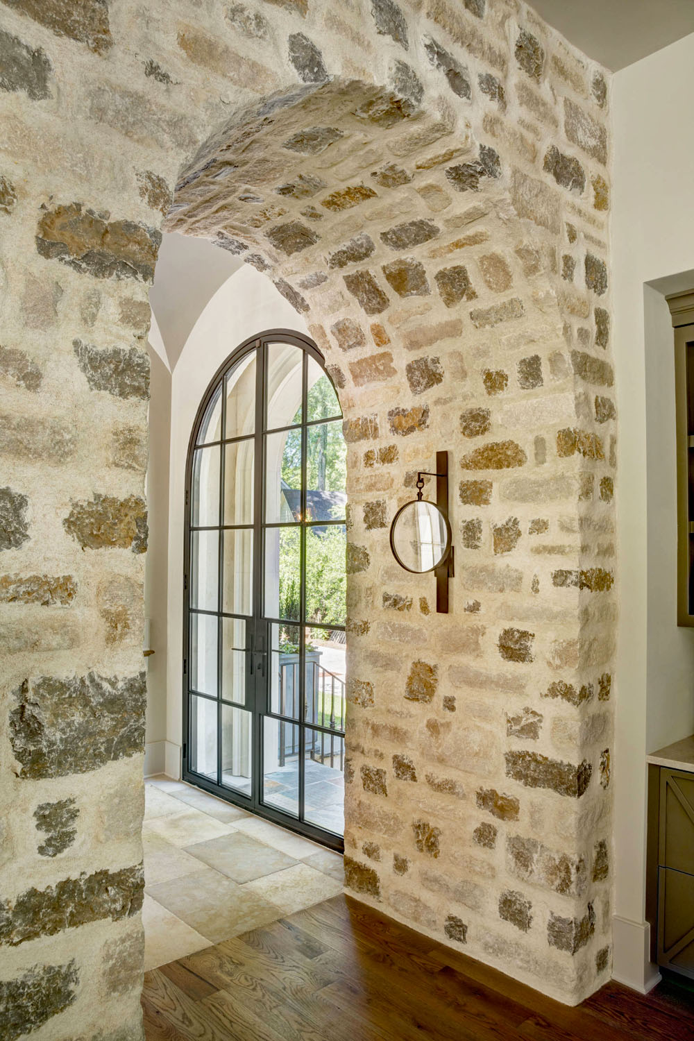 Stone Arched Doorway and Arched Steel Door