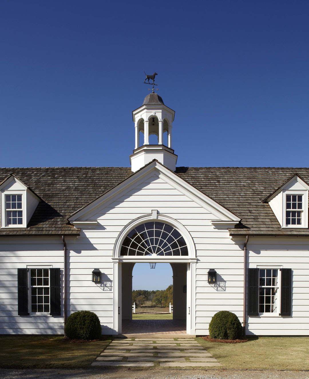 Breezeway with Arched Doors and Classical Cupola