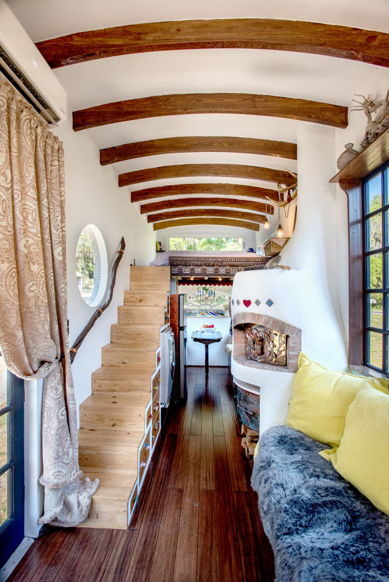 Tiny House with Staircase and Arched Wood Beams