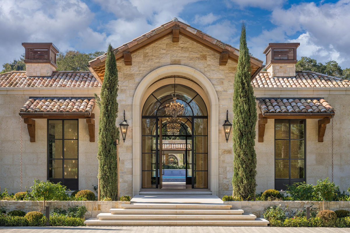 Italian Style Villa Arched Front Entrance with Stone Wall