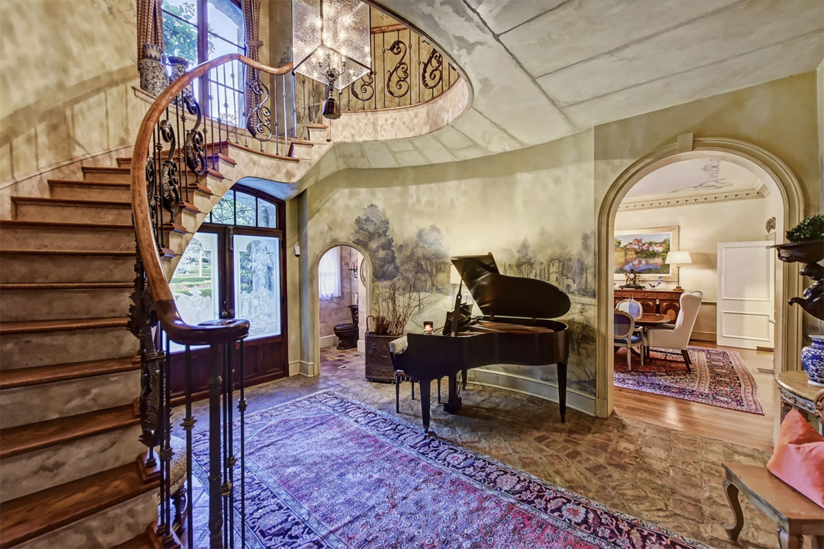 Foyer with Spiral Staircase and Hand Painted Frescos