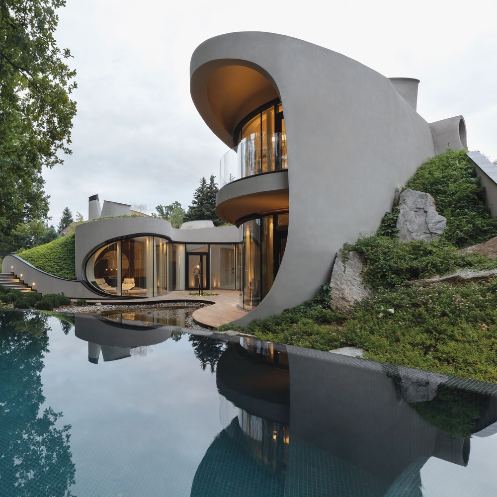 Futuristic Organically Shaped Home Balances Architectural and Natural