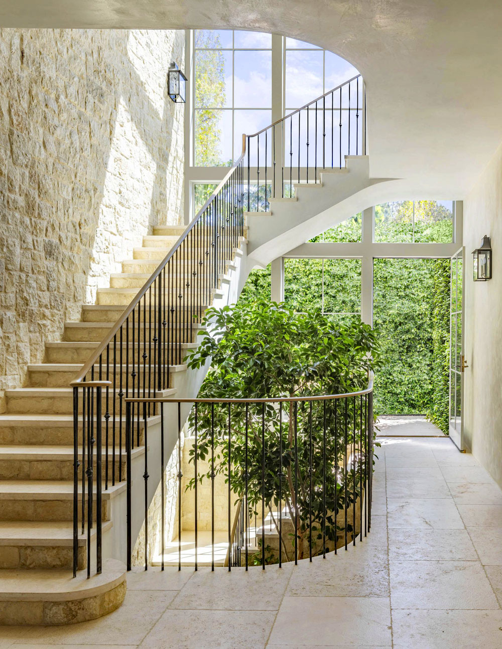 Central Staircase with Stone Wall