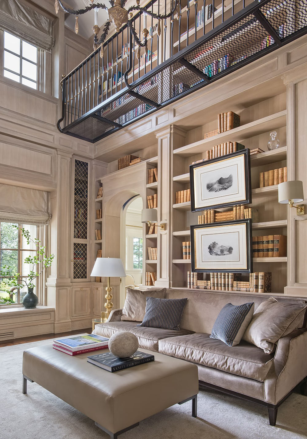 Double-Height Library with White-Oak Paneling and Metal Upper Balcony
