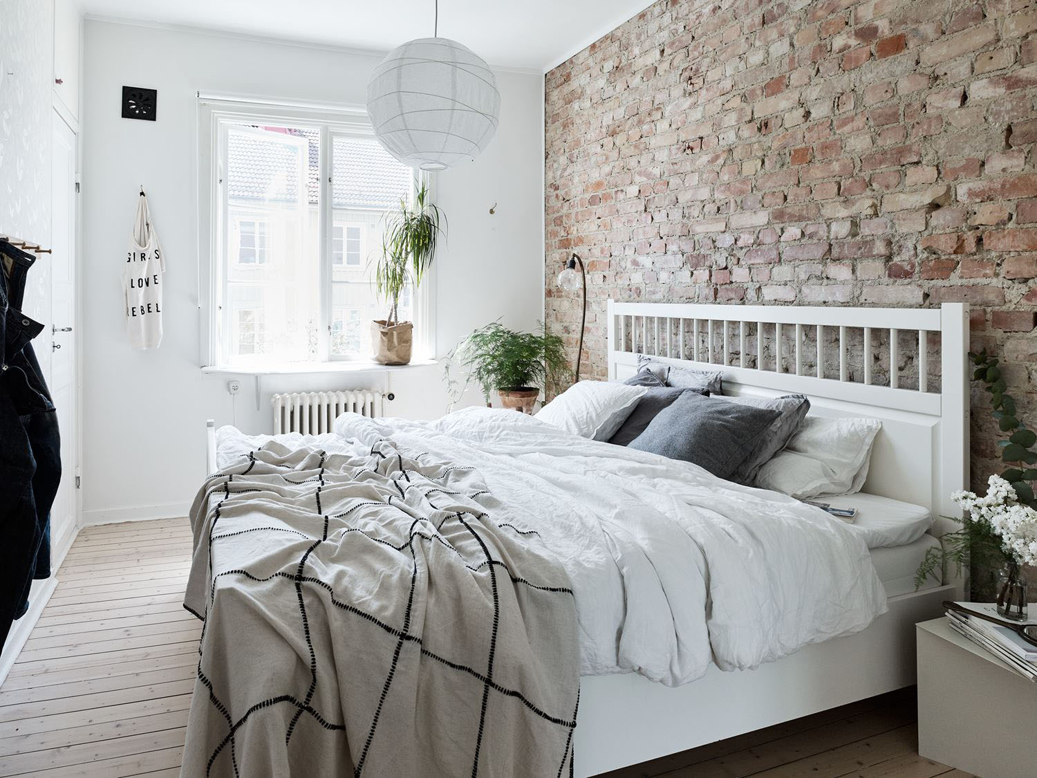 Charming Bedroom with Brick Wall