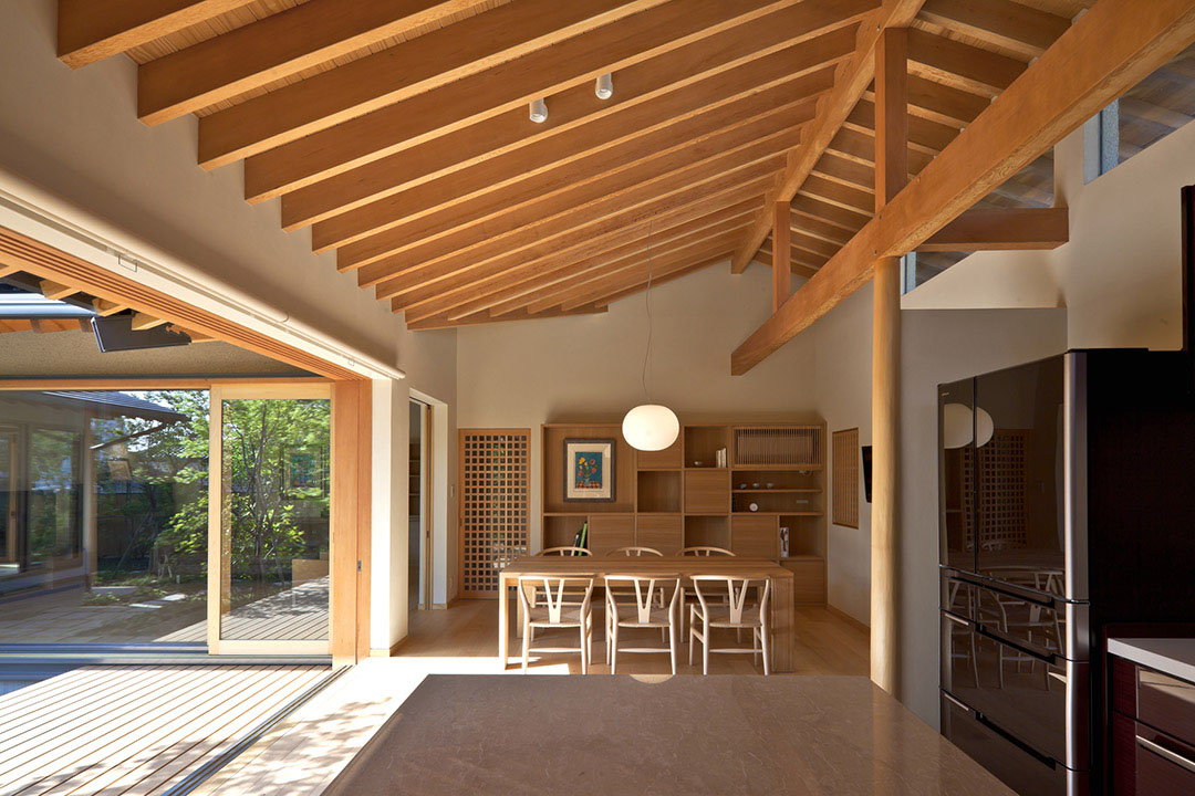 Timber Framed Japanese House Built Around Private Gardens