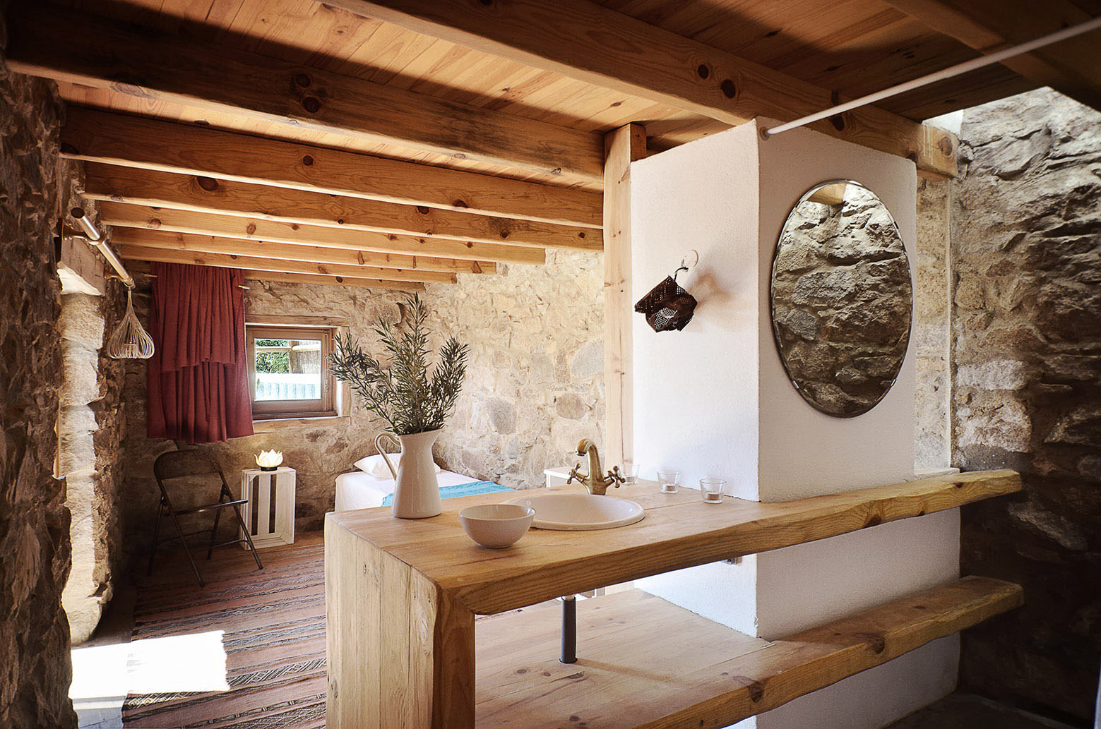 Rustic Bedroom with Stone Walls