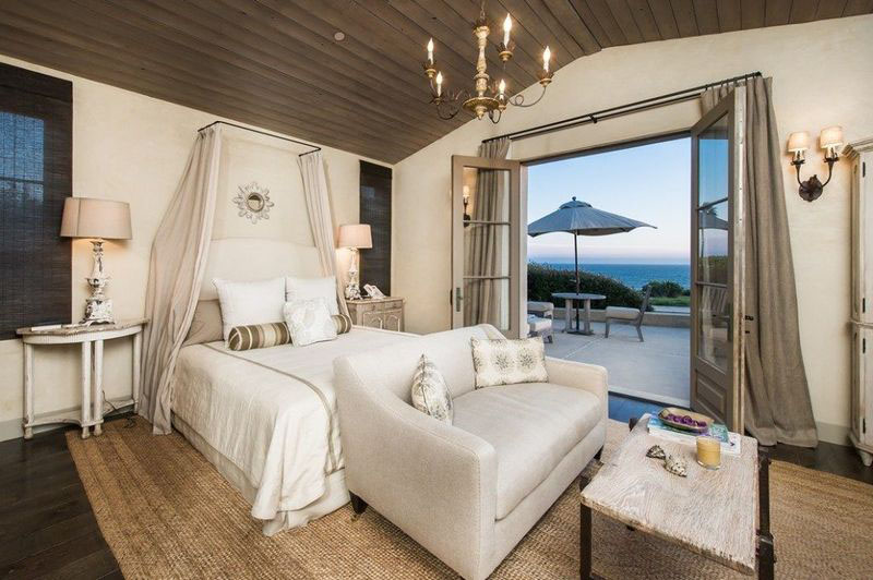 Mediterranean style bedroom with ocean view