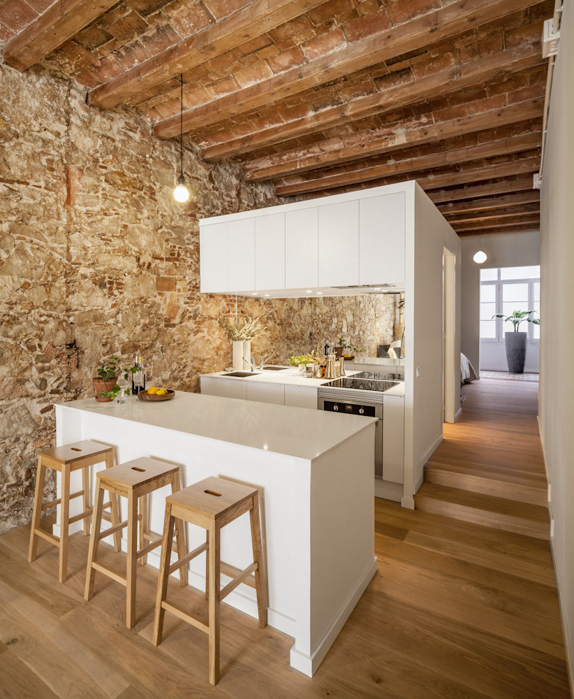 Newly Renovated Minimalist Apartment With Stone Wall And