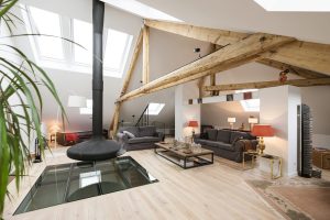 Living Room with Oak Flooring and Exposed Wood Beams