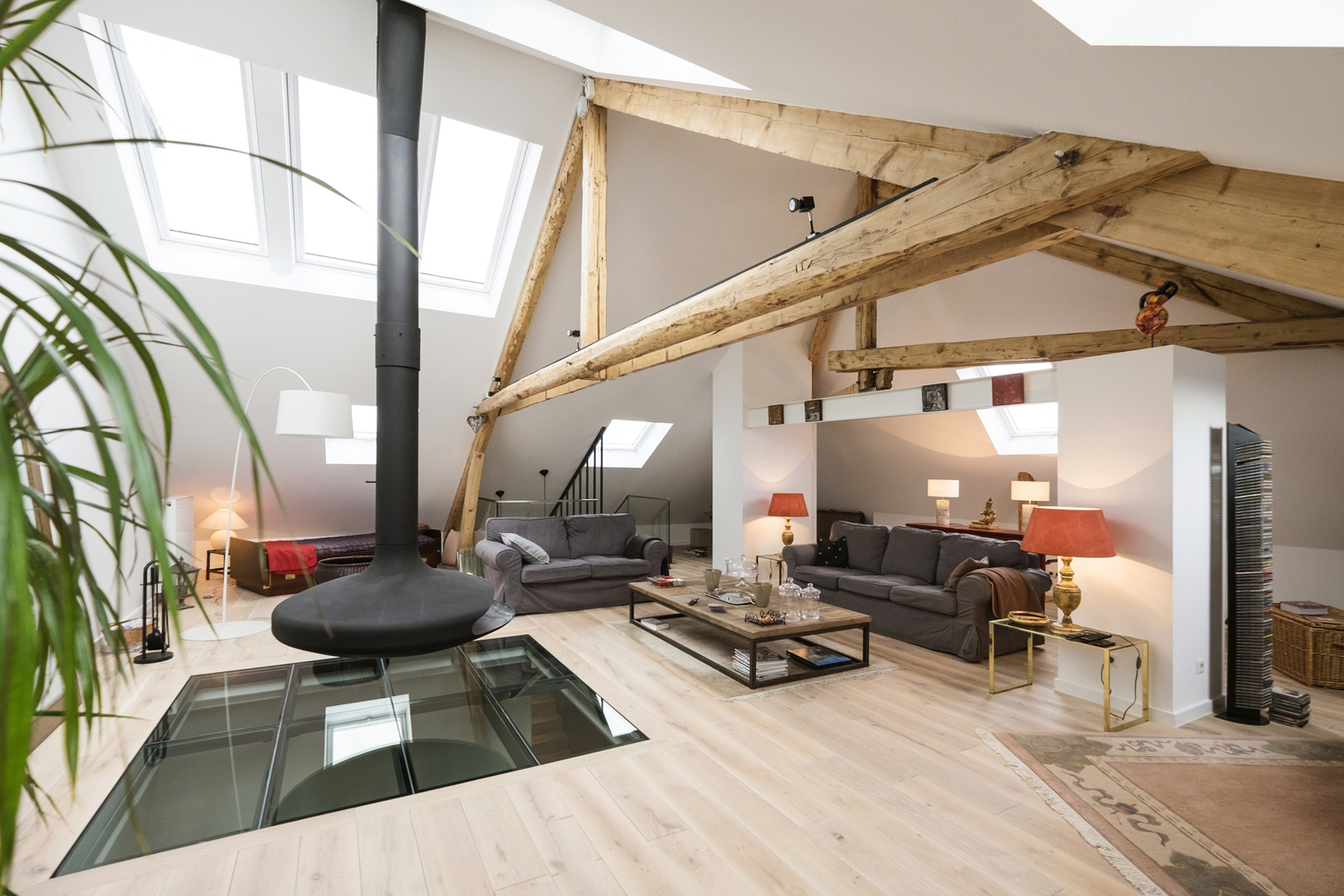 Living Room with White Oak Flooring and Exposed Wood Beams