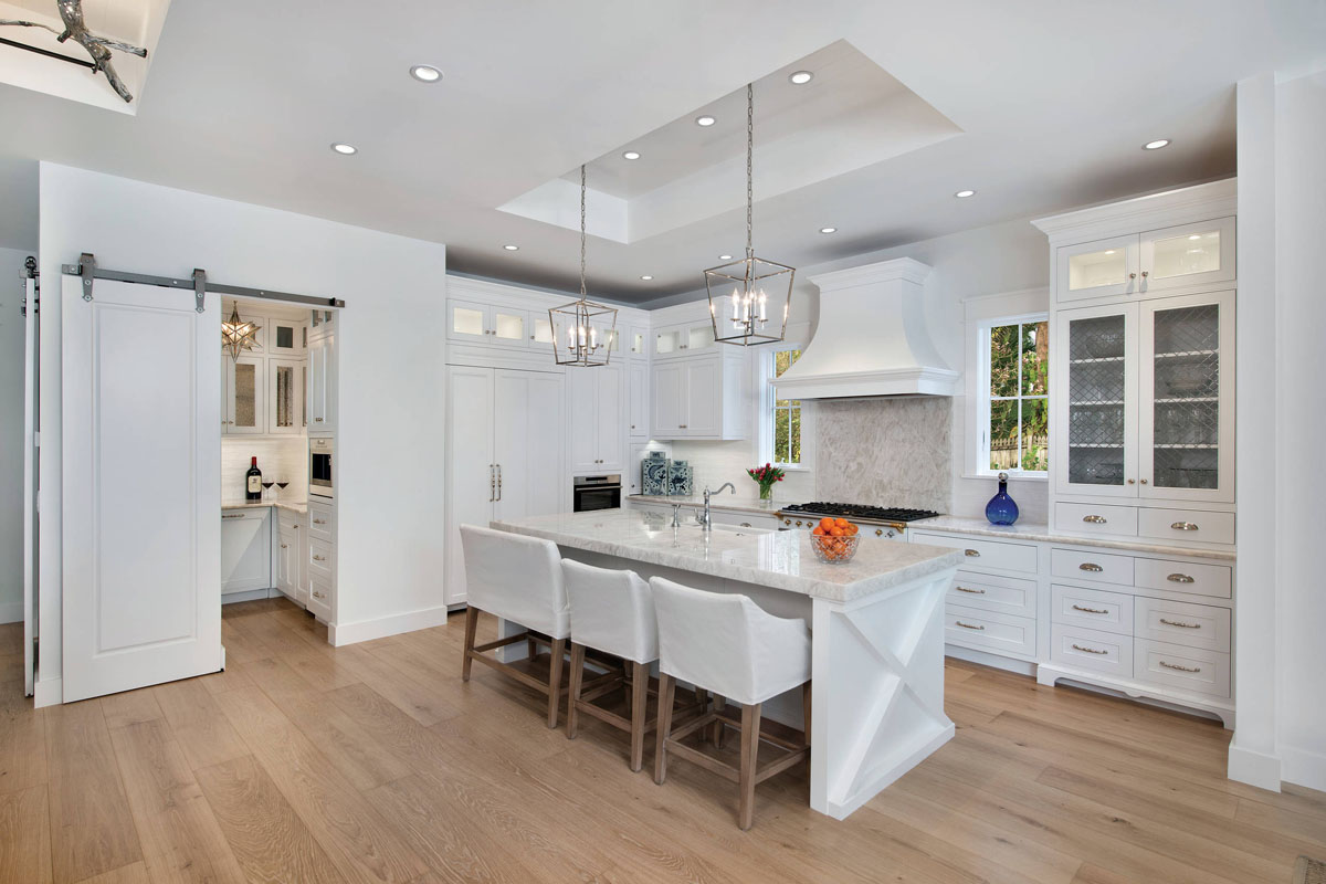 A Barn Door Opens to the Butler’s Pantry