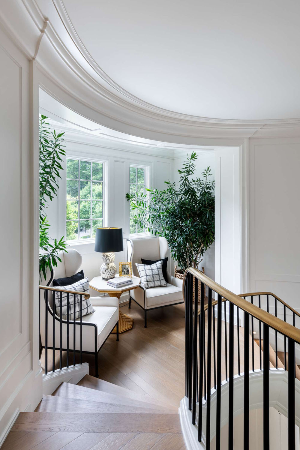 Cozy Round Sitting Nook by the Stairs