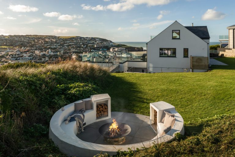 Dramatic Modern Stone Beach House with Glass Façade