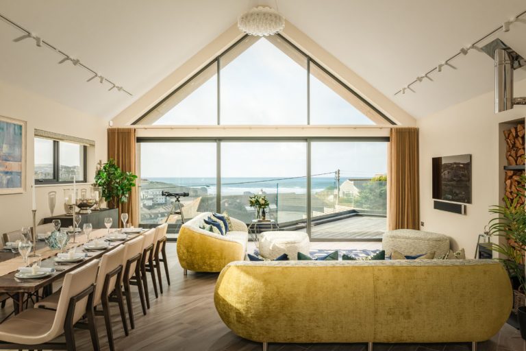 Dramatic Modern Stone Beach House with Glass Façade