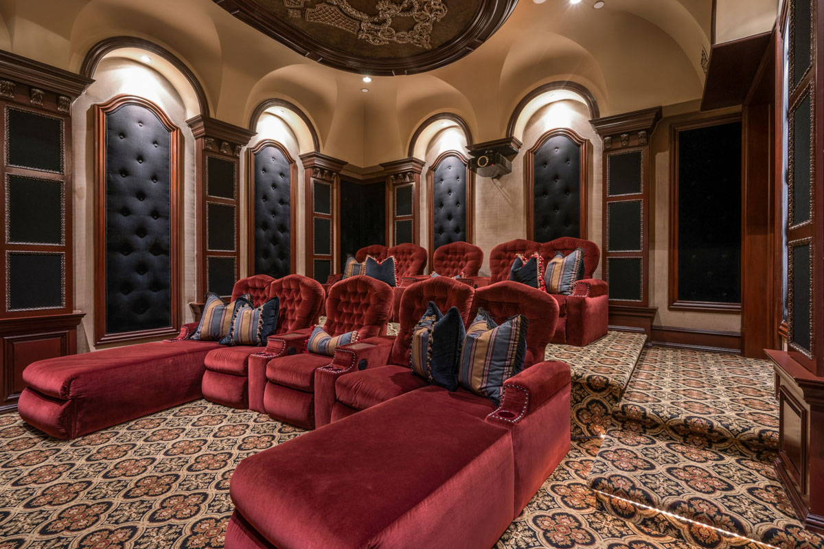 Luxury Home Theater with Red Velvet Sofas