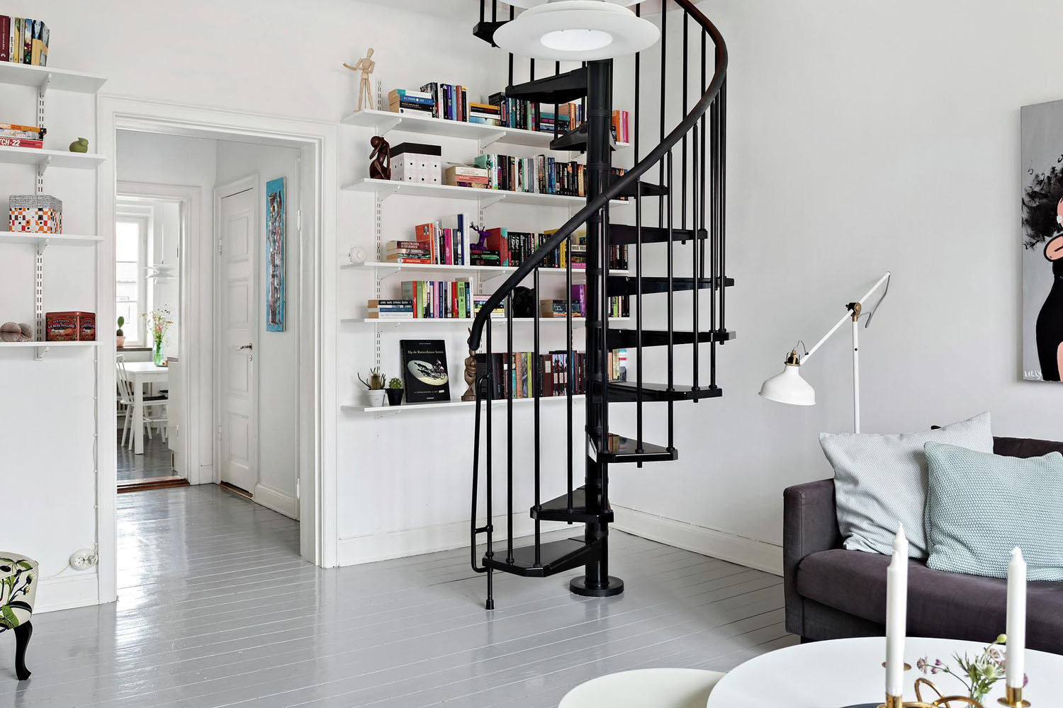 White Living Room with Black Spiral Staircase