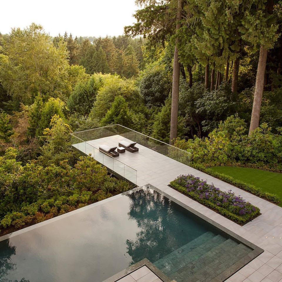 Modern Cantilevered Deck next to Infinity Pool